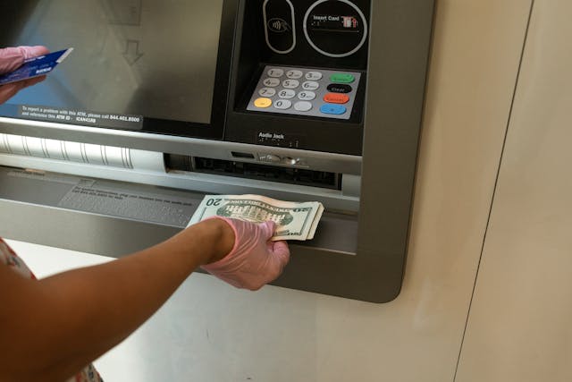 person depositing money